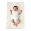 Baby lying on the Dash Anti-Roll Wedge Baby Changing Mat | Baby Bath Time Essentials - Clair de Lune UK
