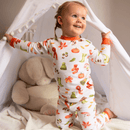 Girl playing in her teepee wearing the Grow Grows Organic Autumnal Amazes Pyjamas | Organic Kids PJs and Nightwear - Clair de Lune UK