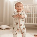 Toddler stood in the nursery wearing the Grow Grows Organic Sleepy Sloth Sleepsuit | Baby Grows and Onesies | Organic Baby Clothes - Clair de Lune UK