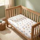 The animal print side of the 2 Pack Fitted Jungle Dream Cot Bed Sheets - 140 x 70 cm on the Clair de Lune Solid Oak Cot Bed | Baby Sheets | Cot & Cot Bed Bedding | Nursery Linen - Clair de Lune UK