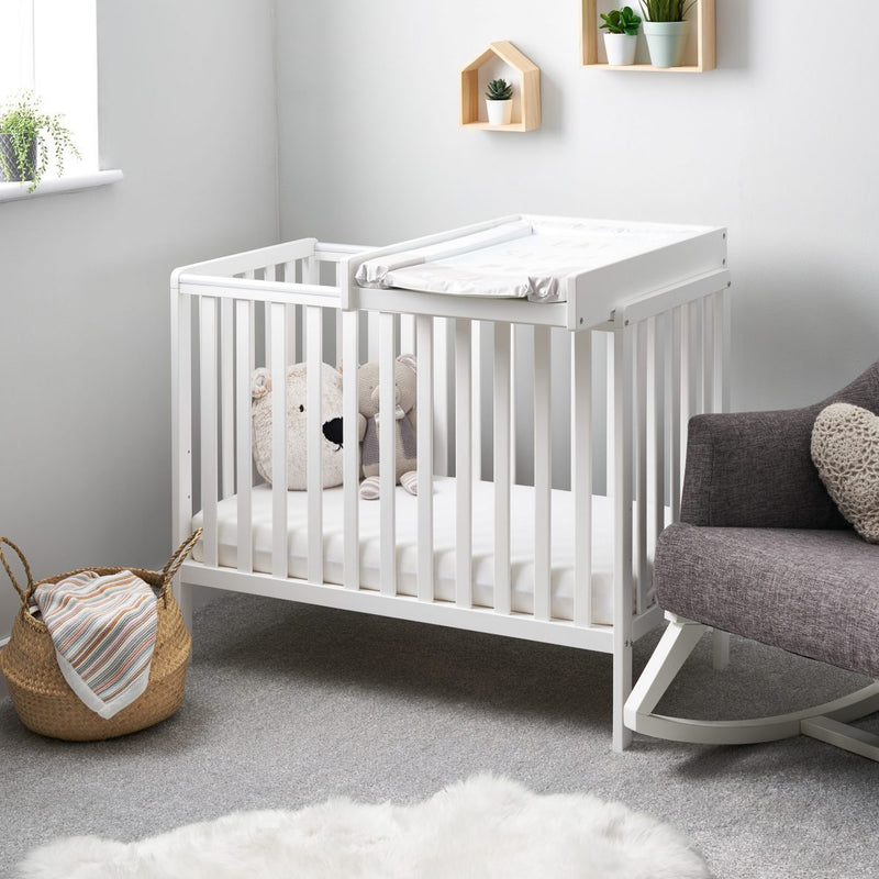 Obaby Space Saver Cot Top Changer on the white Obaby Bantam Space Saver Cot | Baby Changing Units, Tables & Cot Top Changers | Baby Bath Time - Clair de Lune UK