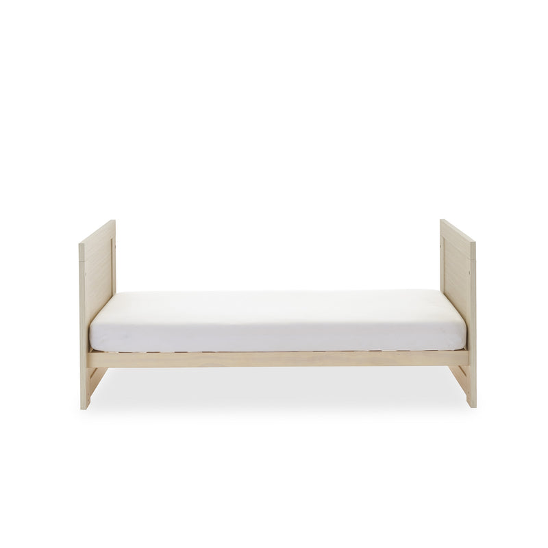 The front of the cot bed from the Obaby Nika Oatmeal Cot Bed and Room Sets transformed to a toddler bed | Nursery Furniture Sets | Room Sets | Nursery Furniture - Clair de Lune UK