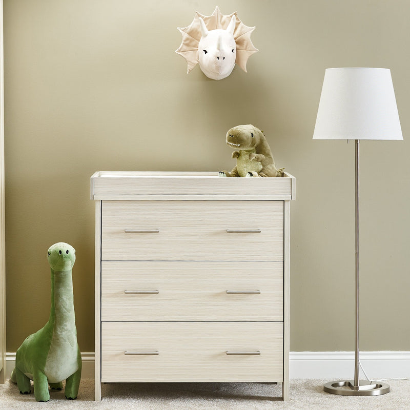 Obaby Nika Oatmeal Closed Changing Unit & Dresser in a gender-neutral nursery room | Baby Bath & Changing Units | Baby Bath Time - Clair de Lune UK