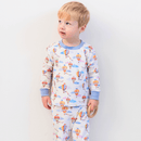 Toddler wearing the Grow Grows Organic Up, Up & Away Pyjamas on white background | Organic Kids PJs and Nightwear - Clair de Lune UK