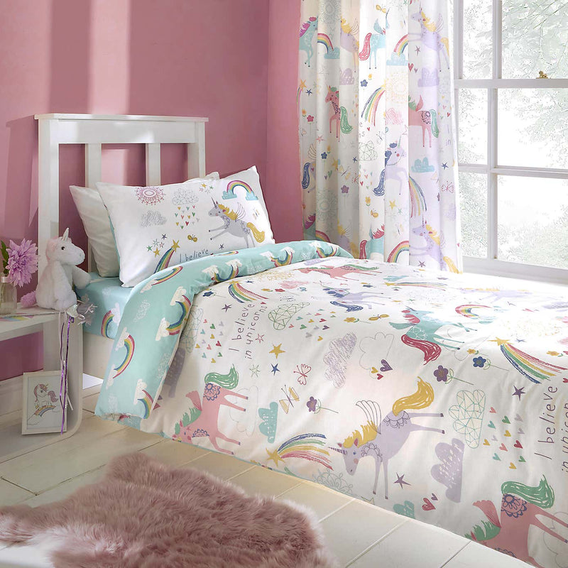 The unicorn side of the Bedlam Rainbow Unicorn Reversible Junior Bed Duvet Cover and Pillowcase Set | Cot, Cot Bed & Toddler Bed Bedding | Bedding - Clair de Lune UK
