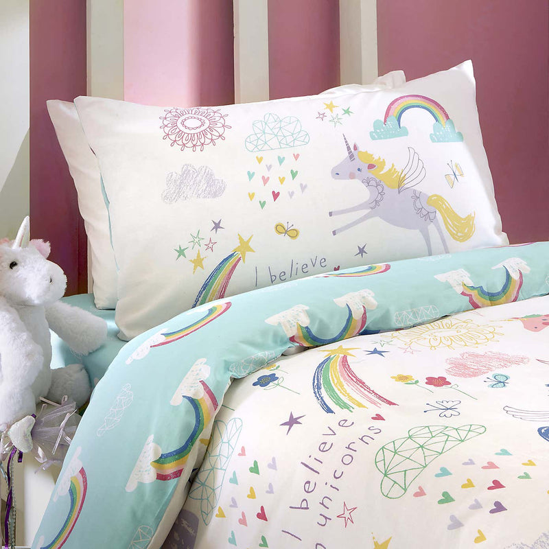 The pillowcase with the unicorn print of the Bedlam Rainbow Unicorn Reversible Junior Bed Duvet Cover and Pillowcase Set | Cot, Cot Bed & Toddler Bed Bedding | Bedding - Clair de Lune UK