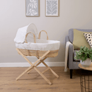 White Waffle Palm Moses Basket and Natural Pine Folding Stand in a Greige Living Room | Moses Baby Baskets, Bassinets | Nursery Furniture - Clair de Lune UK