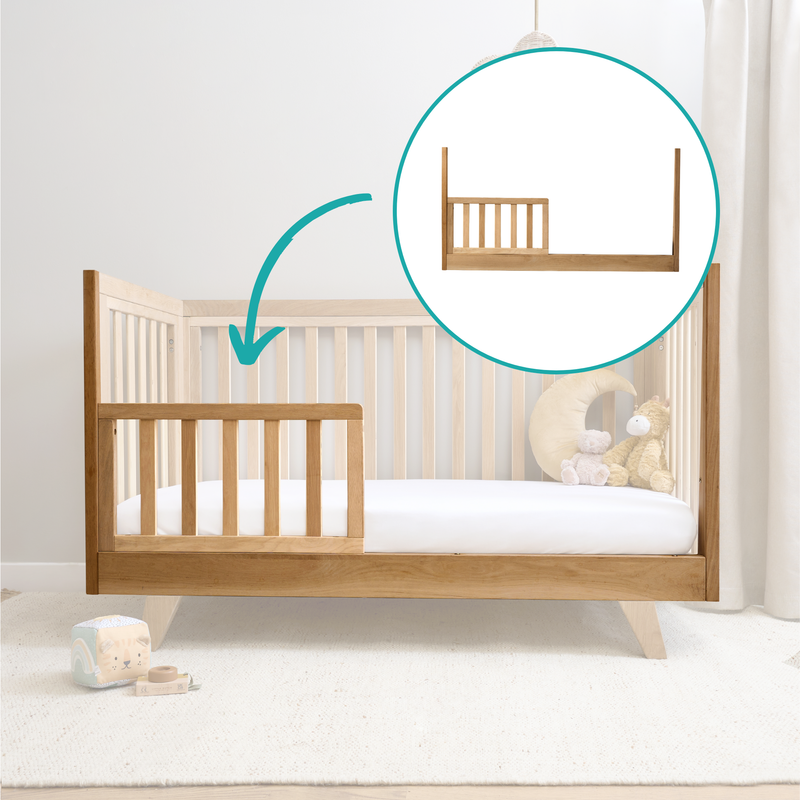 Landscape view of the Oak Cot Bed converted to a toddler bed with the extension kit Close up of Oak Cot Bed Extension Kit converted to a toddler bed in neutral nursery | Cots, Cot Beds, Toddler & Kid Beds | Nursery Furniture - Clair de Lune UK