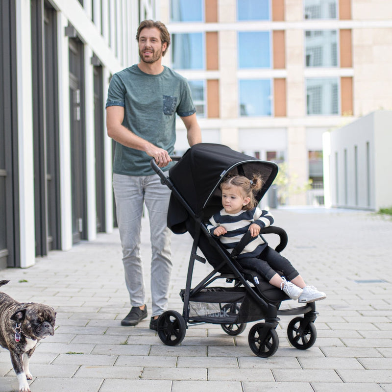 Dad pushing his Hauck Rapid 4 Trio Travel System | Buggies, Strollers & Pushchairs | Travel With Baby - Clair de Lune UK