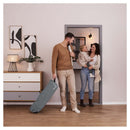 Hauck Sleep N Easyfold travel cot packed in the travel bag being wheeled by dad and mum carrying toddler | Crib & Travel cots for baby and toddler - Clair de Lune UK