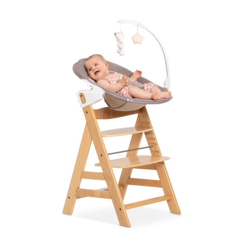 Baby playing on the Sand and Natural Hauck Alpha + Wooden High Chair & Deluxe Bouncer Bundle | Highchairs | Feeding & Weaning - Clair de Lune UK