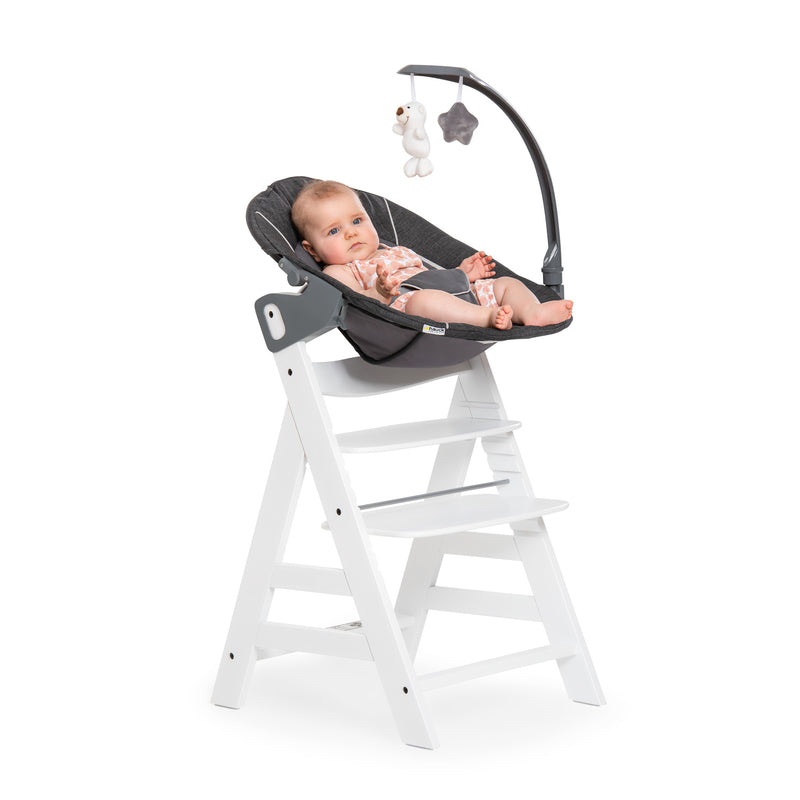 Baby playing on the Grey and White Hauck Alpha + Wooden High Chair & Deluxe Bouncer Bundle | Highchairs | Feeding & Weaning - Clair de Lune UK