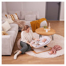 Mum attending to her baby in the Hauck Highchair Bouncer Eco | Baby Bouncers and High Chairs - Clair de Lune UK