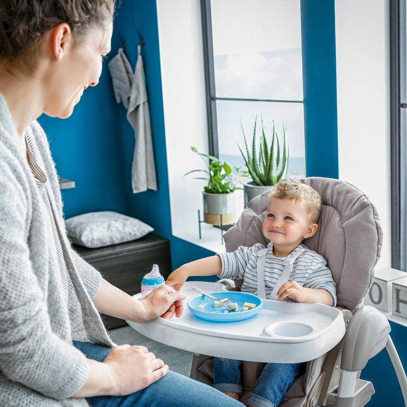 Toddler enjoying his lunch on the Stretch Grey Hauck Travel 3in1 Sit N Relax High Chair & Bouncer | Highchairs | Feeding & Weaning - Clair de Lune UK