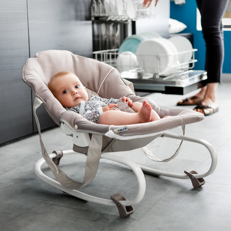 Baby playing on the Stretch Grey Hauck Travel 3in1 Sit N Relax High Chair & Bouncer when transformed to a bouncer | Highchairs | Feeding & Weaning - Clair de Lune UK