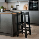 Stage 1 Black Hauck Learn N Explore Learning Tower in a contemporary black moody kitchen| Feeding & Weaning | Montessori Furniture For Babies & Toddlers - Clair de Lune UK