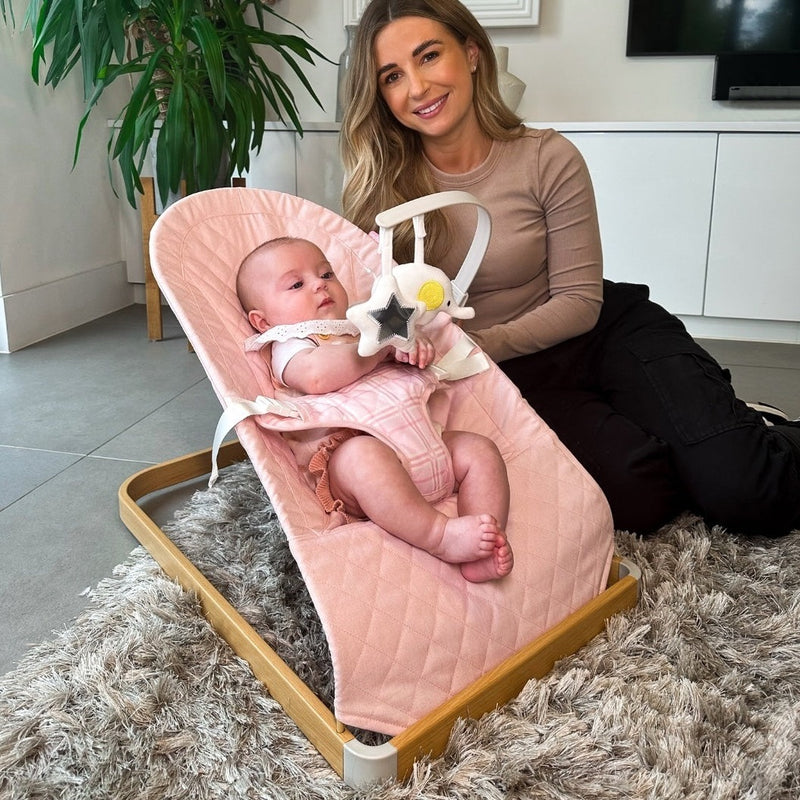 Dani Dyer and her baby on the My Babiie Dani Dyer Pink Plaid Baby Bouncer | Baby Swings, Rockers & Baby Bouncers | Toys - Clair de Lune