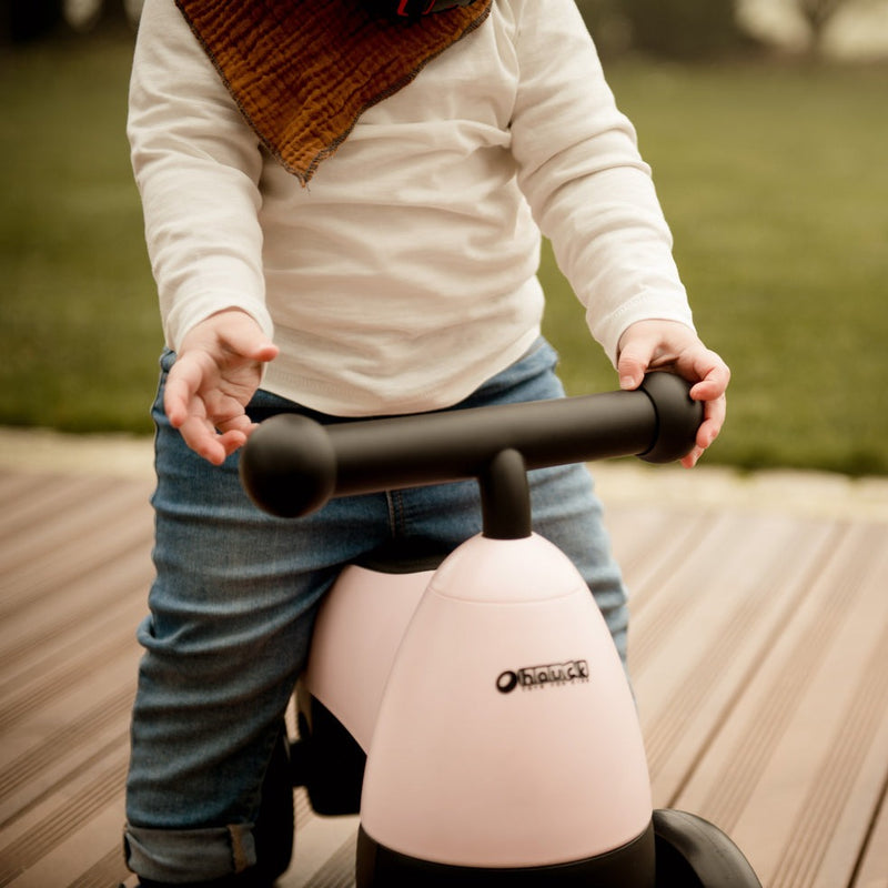 The easy to grab handle of the pink Hauck 1st Ride Four Balance Bike | Toddler Bikes | Montessori Activities For Babies & Kids - Clair de Lune UK