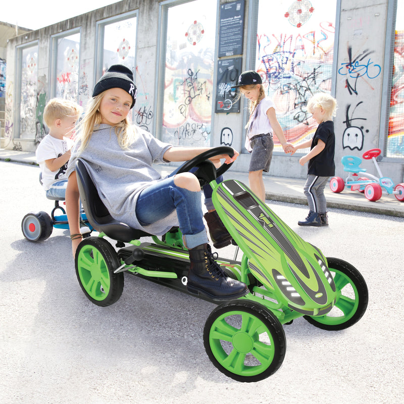 A group of kids riding green Hauck Speedster Go Kart | Wagons & Go Karts | Baby & Kid Travel - Clair de Lune UK