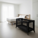 East Coast Travel Cot in a minimalist Hotel Room | Cribs & Travel Cots | Nursery Furniture - Clair de Lune