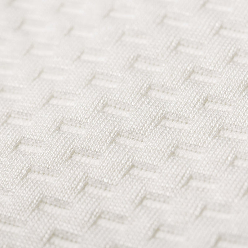 Cuddleco Harmony Cot Mattress in Cot showing the fabric mattress cover close-up - Clair de Lune UK