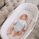 Special Buy - Star Palm Moses Basket with Stand Bundle with sleeping newborn baby in a greige living room | Moses Baby Baskets, Bassinets | Nursery Furniture - Clair de Lune UK