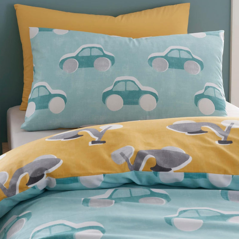 The pillowcase in the duck egg cool car print of the Bedlam Ballet Dancer Pink Reversible Cot Duvet Cover and Pillowcase Set | Cot, Cot Bed & Toddler Bed Bedding | Bedding - Clair de Lune UK