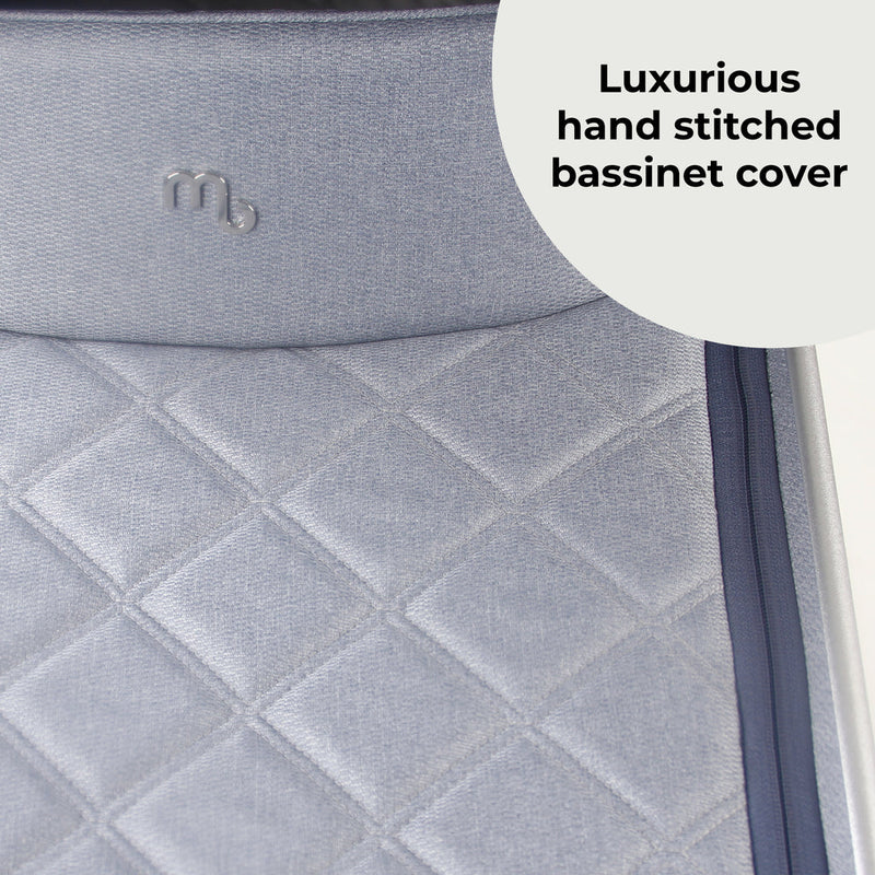 The luxurious bassinet cover of the carrycot from the Steel Blue My Babiie 3-in-1 Travel System with i-Size Car Seat | Pushchairs and Travel Systems | Baby & Kid Travel - Clair de Lune UK