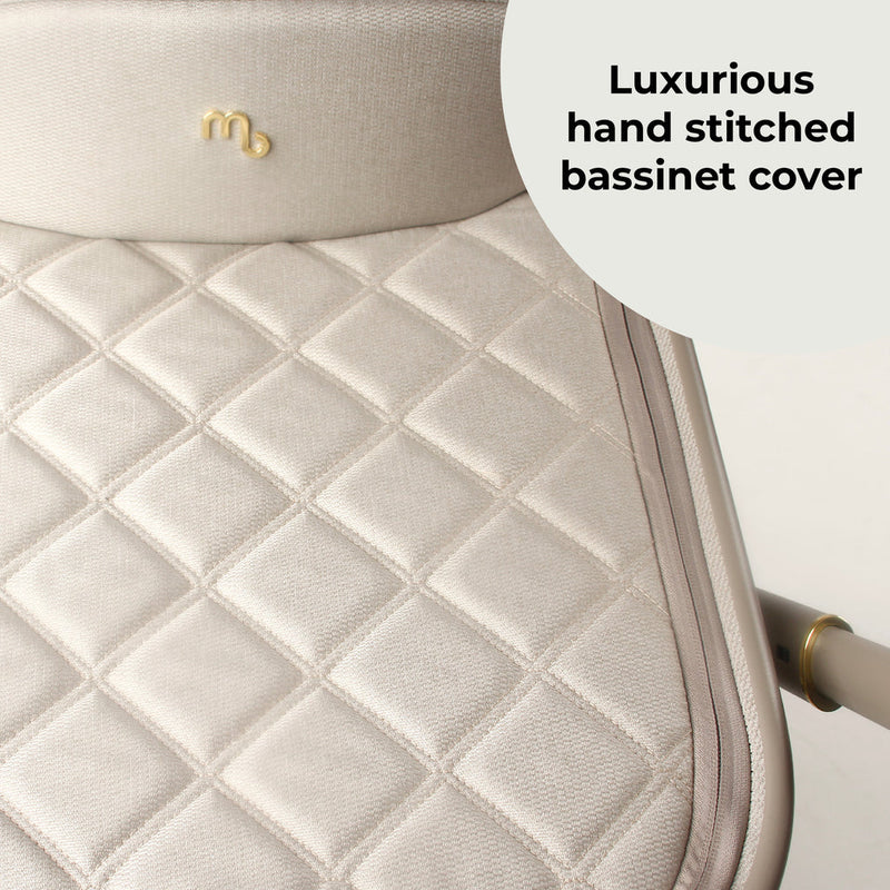 The luxurious bassinet cover of the carrycot from the Ivory My Babiie 3-in-1 Travel System with i-Size Car Seat | Pushchairs and Travel Systems | Baby & Kid Travel - Clair de Lune UK