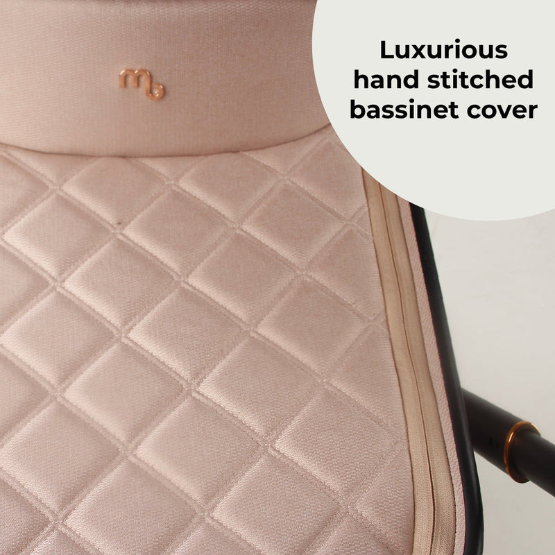 The luxurious bassinet cover of the carrycot from the Pastel Pink My Babiie 3-in-1 Travel System with i-Size Car Seat | Pushchairs and Travel Systems | Baby & Kid Travel - Clair de Lune UK