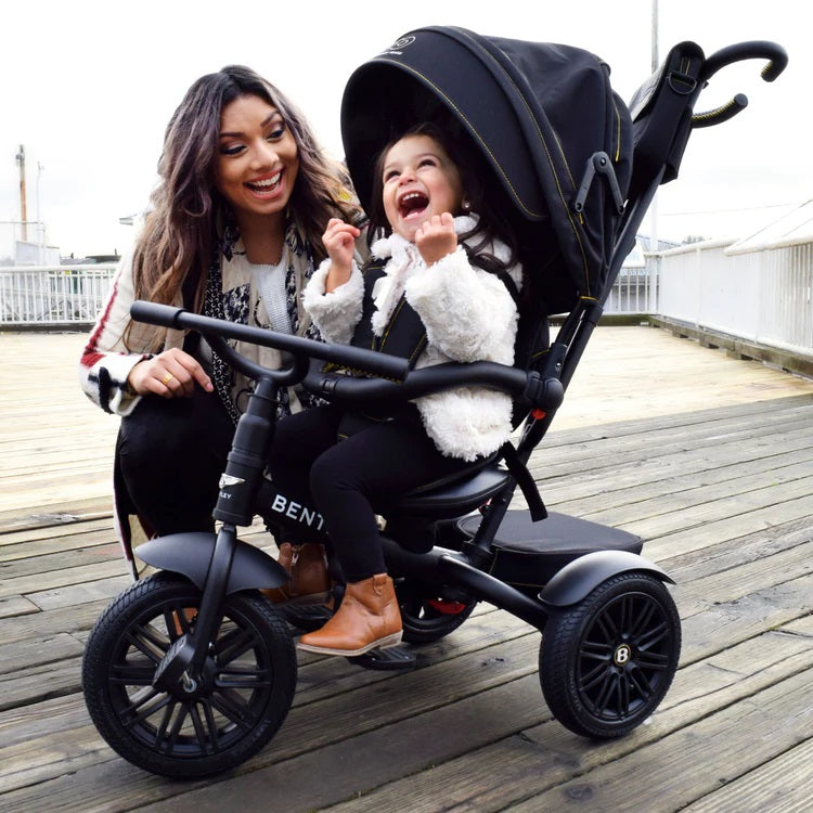 Mum next to her toddler who is sitting on the Matt Black Bentley 6in1 Trike - Convertible Baby Stroller | Strollers, Pushchairs & Prams | Pushchairs, Carrycots & Car Seats Baby | Travel Essentials - Clair de Lune UK