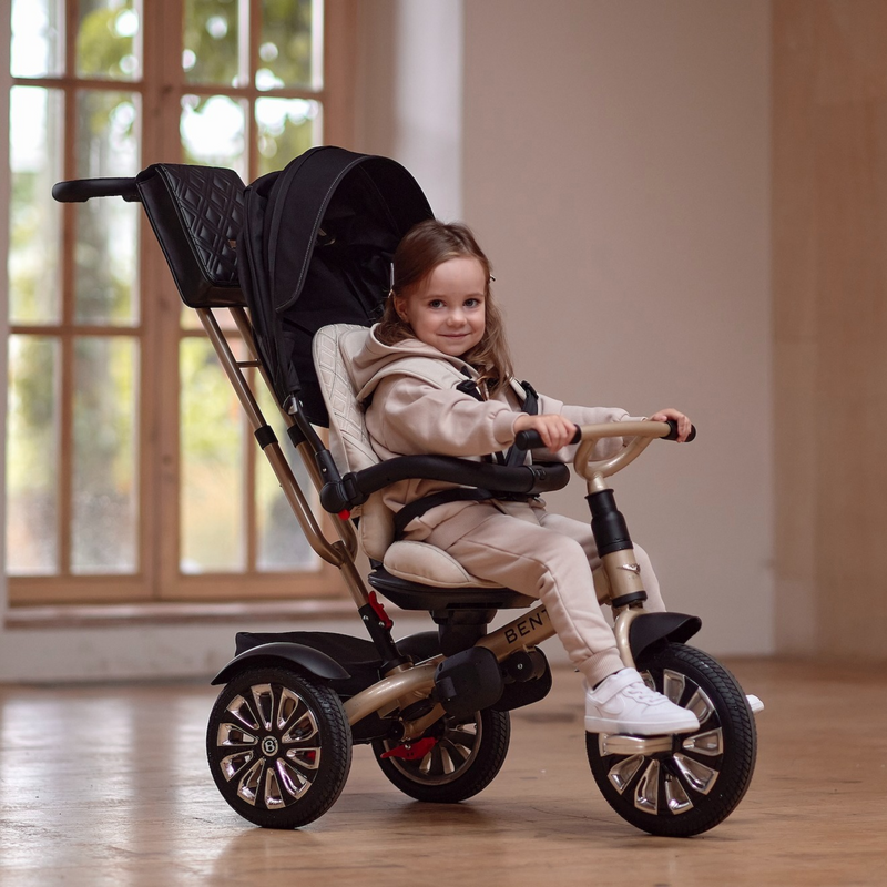 Kid sitting on the Mulliner Bentley 6in1 Trike - Convertible Baby Stroller | Strollers, Pushchairs & Prams | Pushchairs, Carrycots & Car Seats Baby | Travel Essentials - Clair de Lune UK