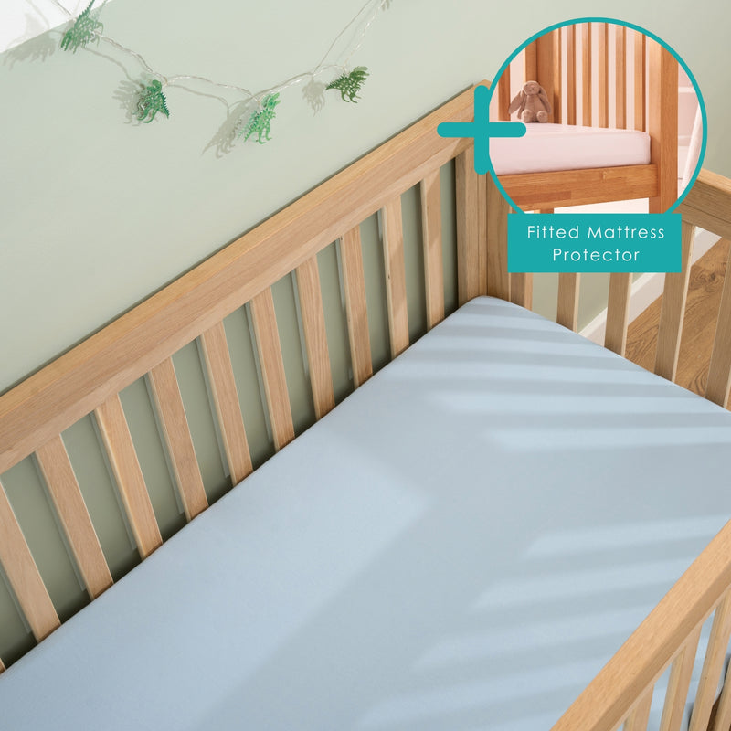  2 Pack Blue Fitted Cotton Cot Sheets - 120 x 60 cm on a cot mattress in the oak cot bed bundled with a mattress protector | Soft Baby Sheets | Cot & Cot Bed Bedding | Nursery Linen - Clair de Lune UK