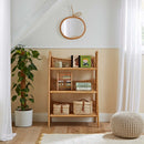 CuddleCo Aria 3 Tier Shelving Unit by a light and airy window in a Scandi style nursery | Nursery Furniture | Storage and Shelving - Clair de Lune UK