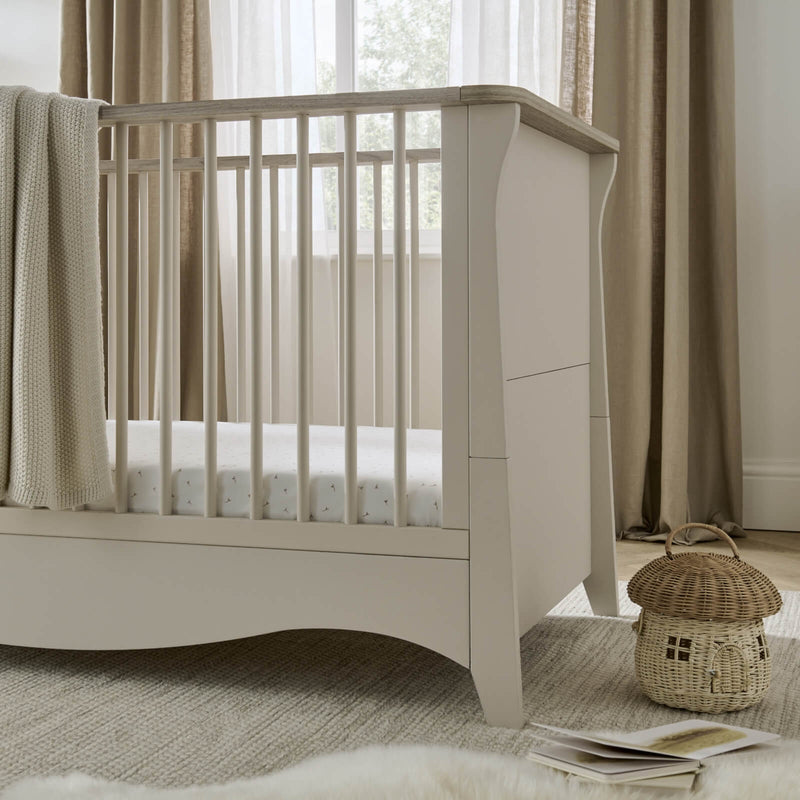 The luxurious cot bed of the Cashmere CuddleCo Clara 2pc Nursery Set - 3 Drawer Dresser/Changer & Cot Bed in a natural Scandi Cream gender-neutral nursery | Nursery Furniture Sets | Room Sets | Nursery Furniture - Clair de Lune UK