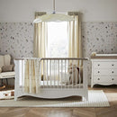 White CuddleCo Clara 2 Piece Nursery Furniture Set of Cot Bed and Changing Unit on white background | Nursery Furniture | Cot Bed - Clair de Lune UK