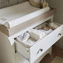 Close up of the Clara Changing Unit Drawers, part of the White CuddleCo Clara 3 Piece Nursery Furniture Set in a cosy neutral nursery | Nursery Furniture | Cot Bed - Clair de Lune UK