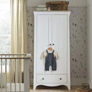 The Clara single wardrobe, part of the White CuddleCo Clara 3 Piece Nursery Furniture Set in a cosy neutral nursery | Nursery Furniture | Cot Bed - Clair de Lune UK