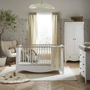 White CuddleCo Clara 3 Piece Nursery Furniture Set in a cosy neutral nursery | Nursery Furniture | Cot Bed - Clair de Lune UK
