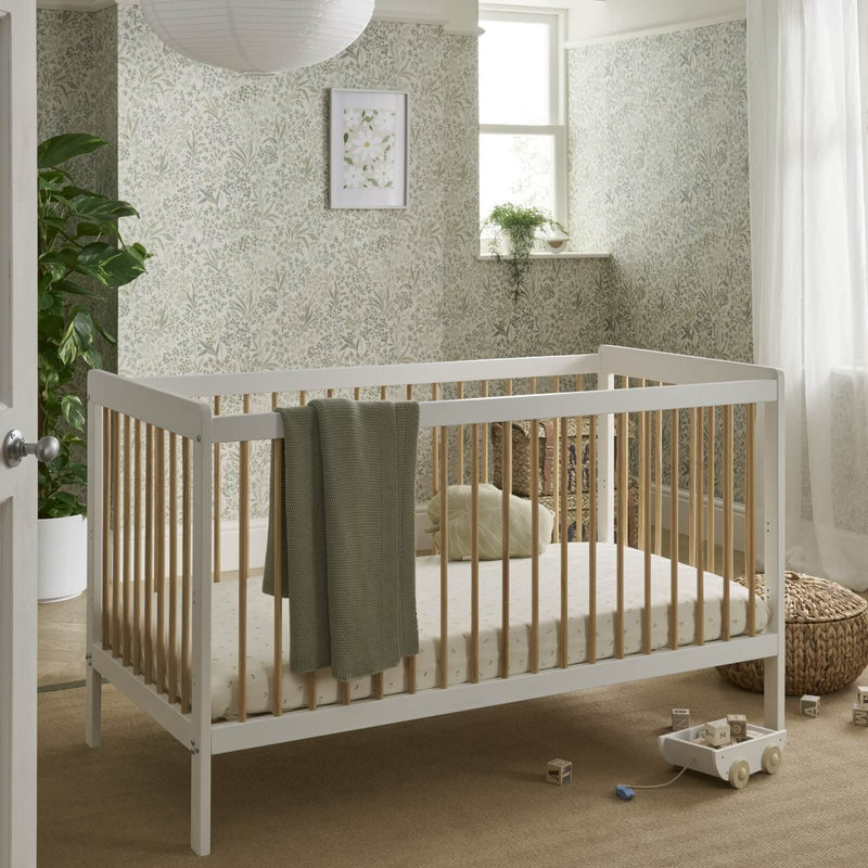 The cot bed of the Cuddleco Nola Scandi Cot Bed & Room Sets in a gender-neutral nursery room | Nursery Furniture Sets | Room Sets | Nursery Furniture - Clair de Lune UK