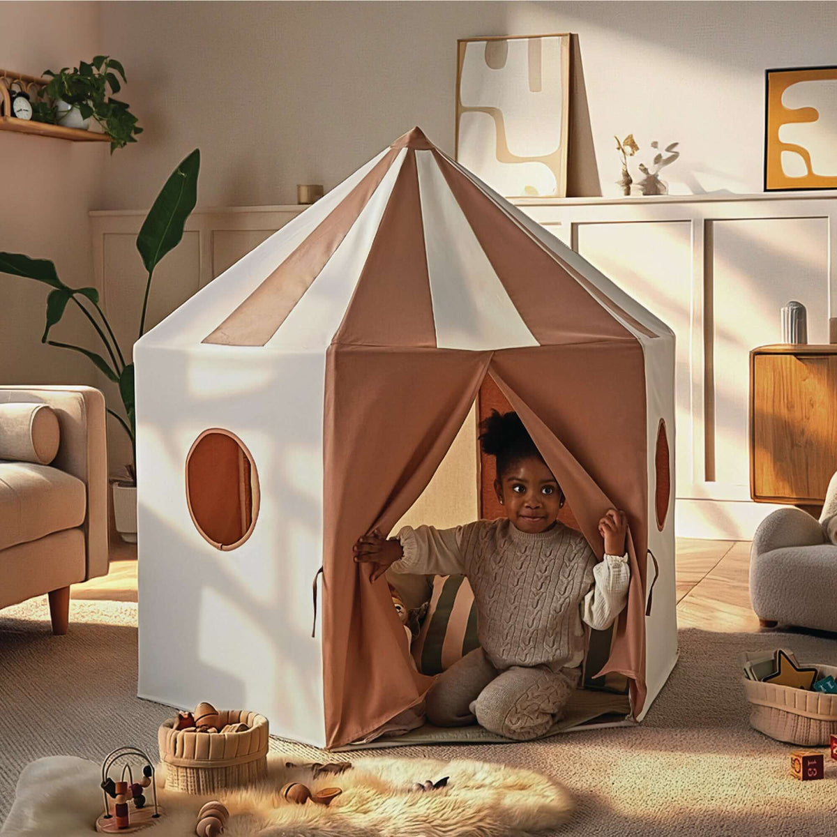 Toddler girl playing in the Tuscany CuddleCo Pavilion Play Tent in a cosy living room with toys and books | Imaginative Play | Toddler Toys and Gifts - Clair de Lune UK