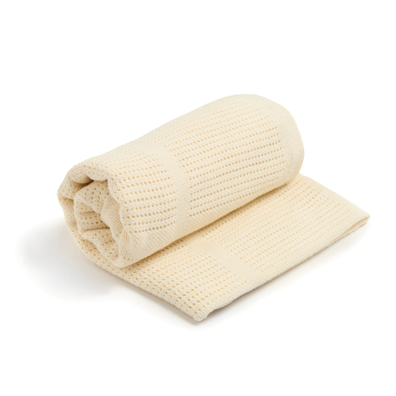 Cream Organic Cotton Cellular Blanket rolled up | Cosy Baby Blankets | Nursery Bedding | Newborn, Baby and Toddler Essentials - Clair de Lune UK