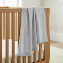 Grey Soft Cotton Cellular Cot Blanket draped over Oak Cot Bed | Cosy Baby Blankets & Swaddles | Nursery Linen - Clair de Lune UK