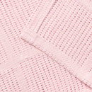 Showcasing the cell construction of the Soft Cotton Cellular Cot Blanket in pink to keep babies warm in the winter and cool in summer | Cosy Baby Blankets & Swaddles | Nursery Bedding | Winter Baby Essentials - Clair de Lune UK