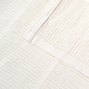 Detail of the cell construction on the Soft Cotton Cellular Shawl in white to keep babies warm in the winter and cool in summer | Cosy Baby Blankets & Swaddles | Nursery Bedding | Newborn Baby Essentials - Clair de Lune UK