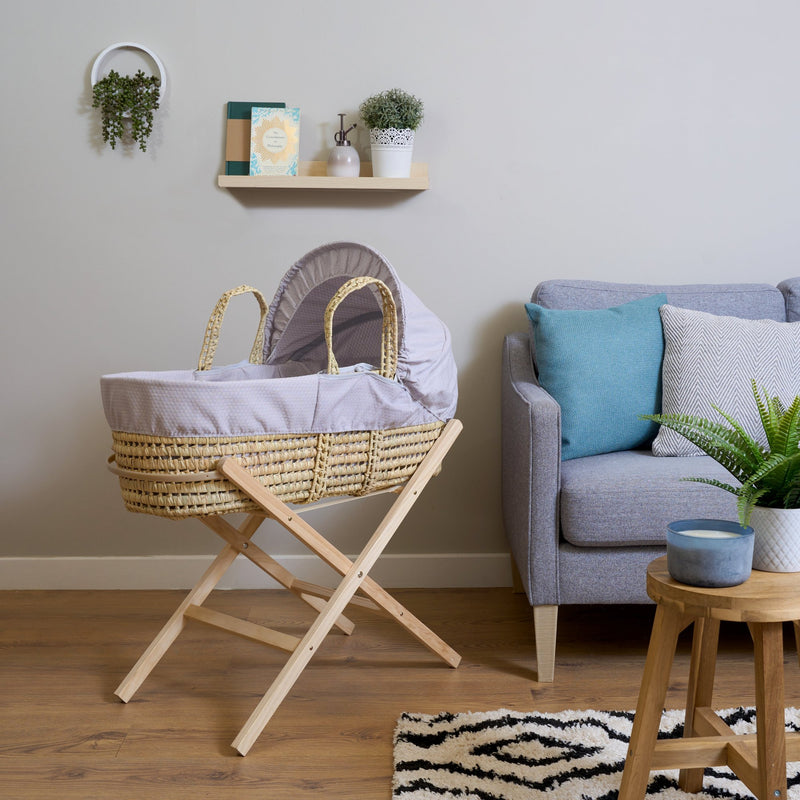 Grey Cotton Dream Palm Moses Basket in Grey Living Room with new grey sofa on oak floor | Moses Baby Baskets, Bassinets | Nursery Furniture - Clair de Lune UK