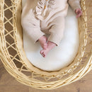 Baby lying on a 3D mesh wicker moses basket mattress | Moses baby basket mattress | Moses & bassinet Accessories | Nursery - Clair de Lune UK