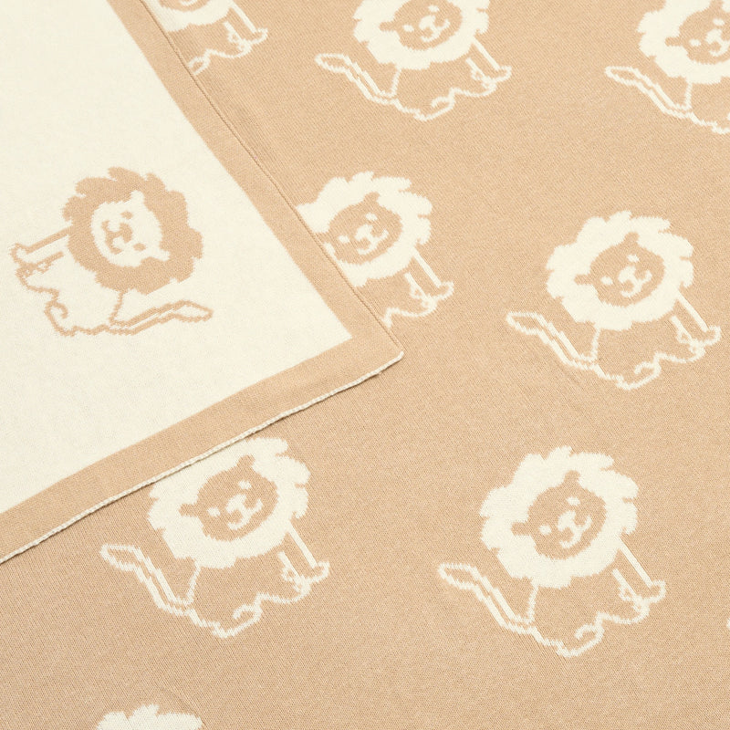 The adorable lion character pattern of the Reversible Lion Knitted Blanket | Cosy Baby Blankets | Nursery Bedding | Newborn, Baby and Toddler Essentials - Clair de Lune UK