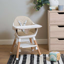 Beige 6in1 High Chair converted to a Baby Floor Seat on a black and white rug in an oak themed kitchen | High chairs | Feeding & Weaning | Toddler Furniture - Clair de Lune UK