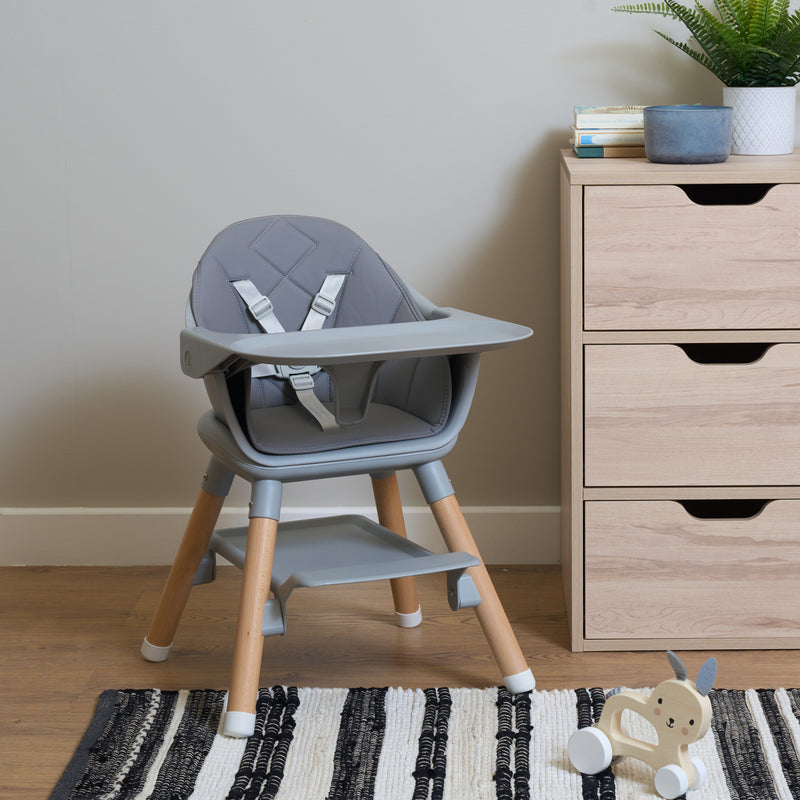 Grey 6in1 High Chair converted to a Baby Floor Seat in the kitchen next to a pine chest of drawers | Highchairs | Feeding & Weaning - Clair de Lune UK